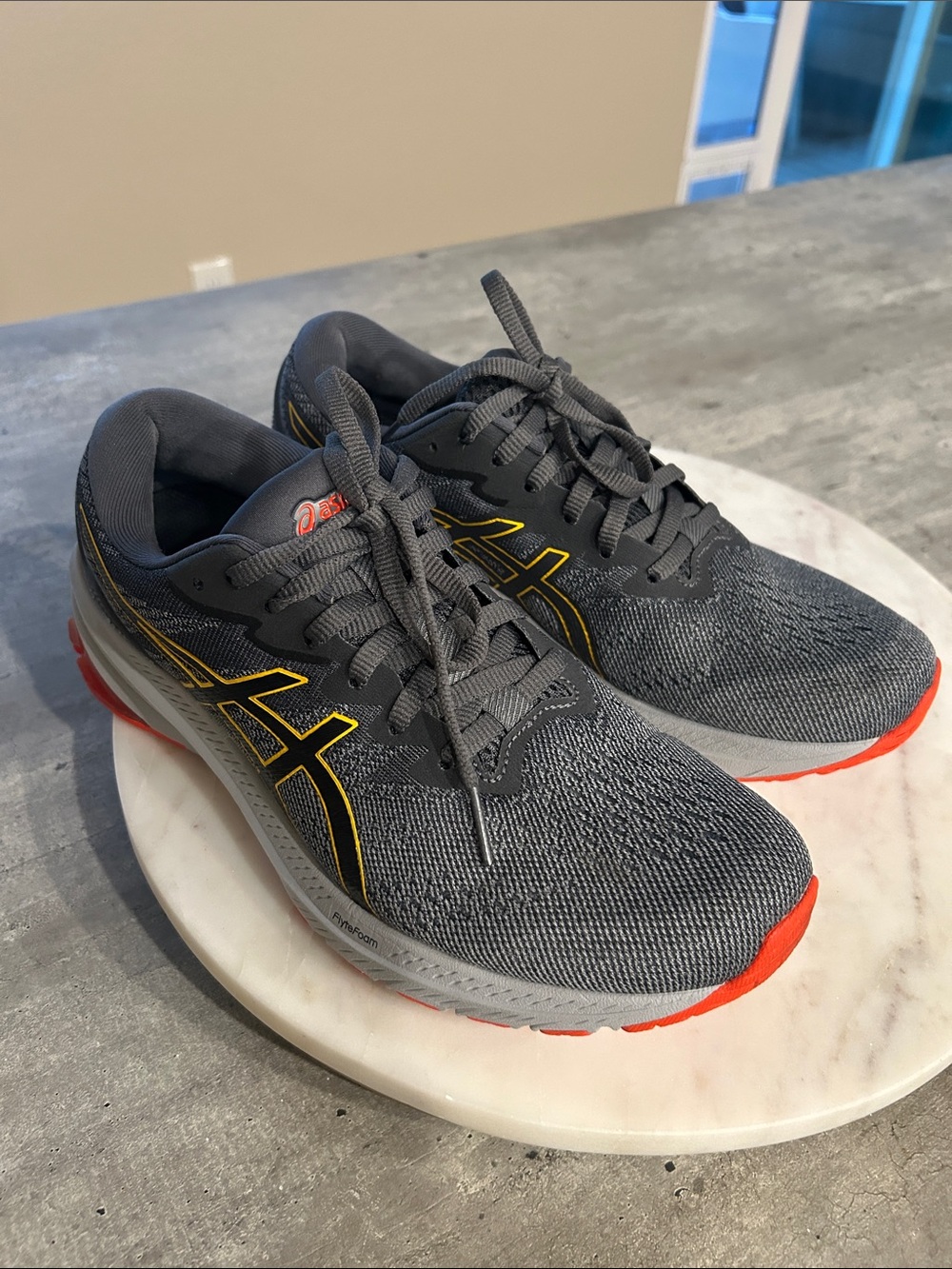 Asics GT-1000 11 Gray Running Shoes with Yellow and Orange Accents men’s size 8